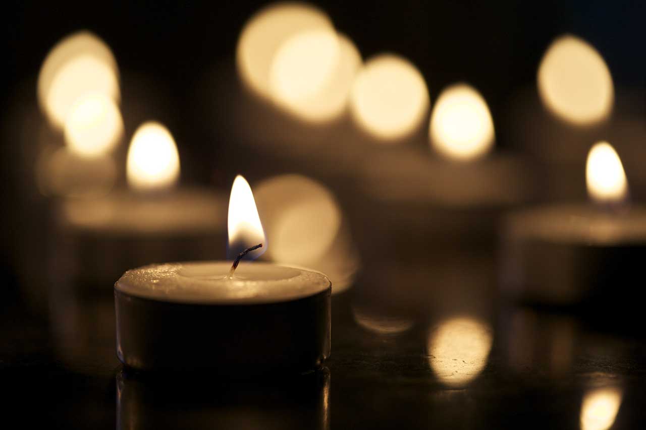 Lighted candles funeral and cremation options at Kriegshauser Brothers